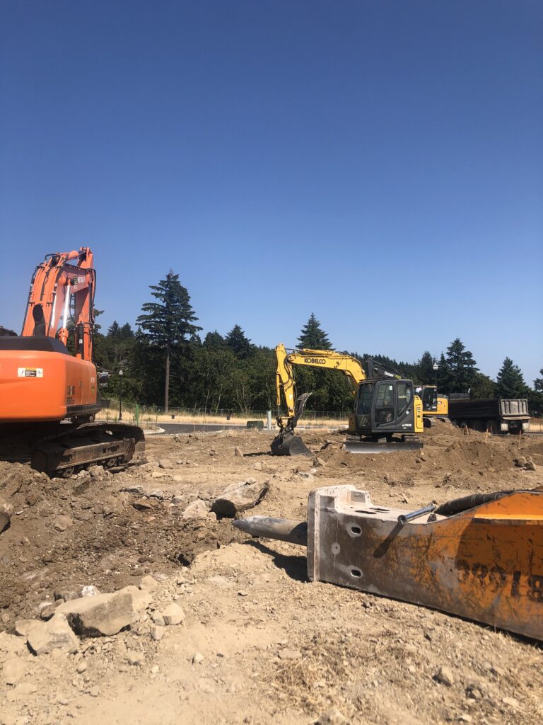 Gradewerks, Boulder Ridge Project - orange excavator